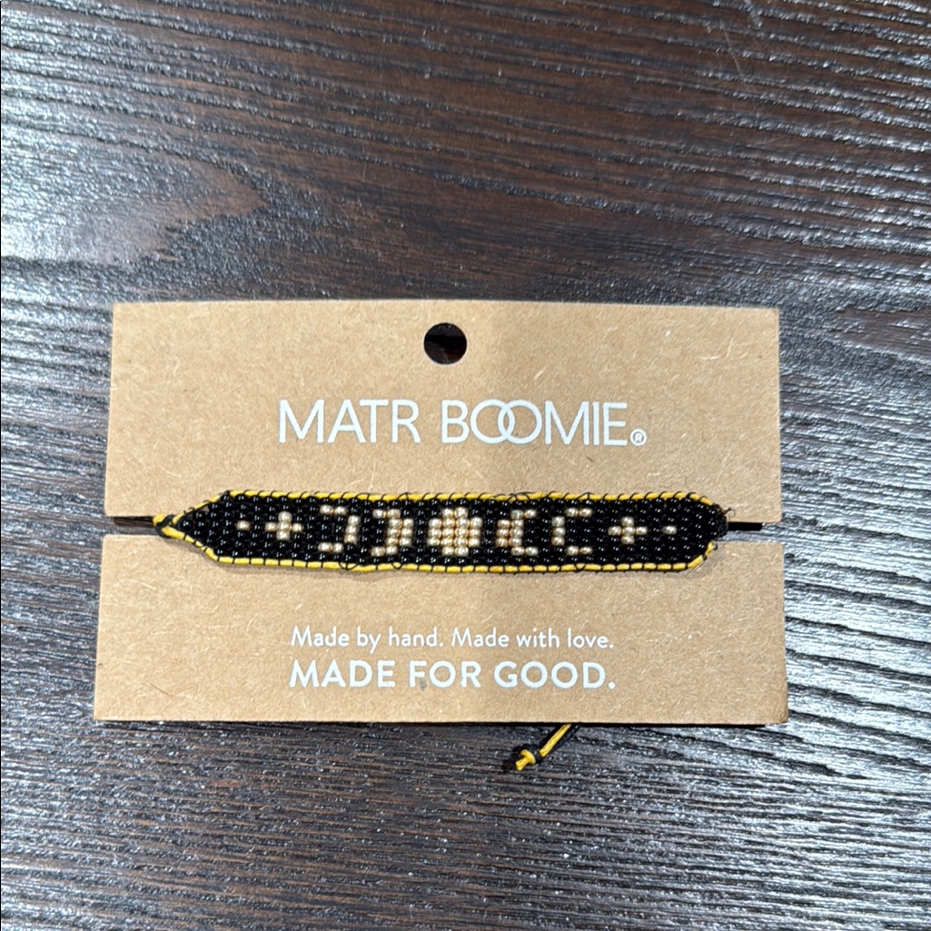 Elegant Black And Gold Bracelet With Modern Design